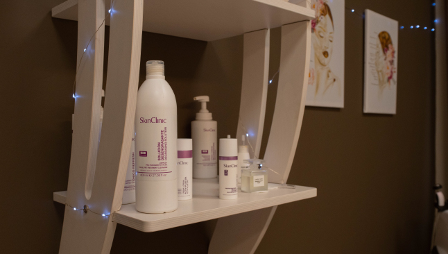 shelf of the beauty center with face and body products