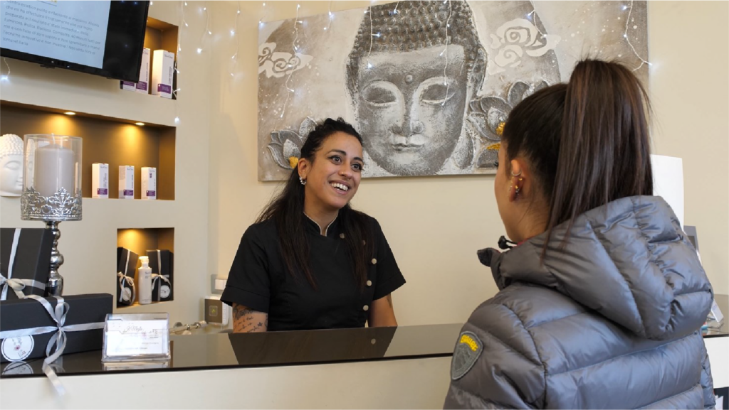 beautician welcoming new client