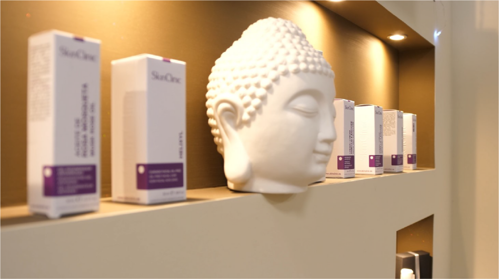 wall with products from the beauty center and a statue